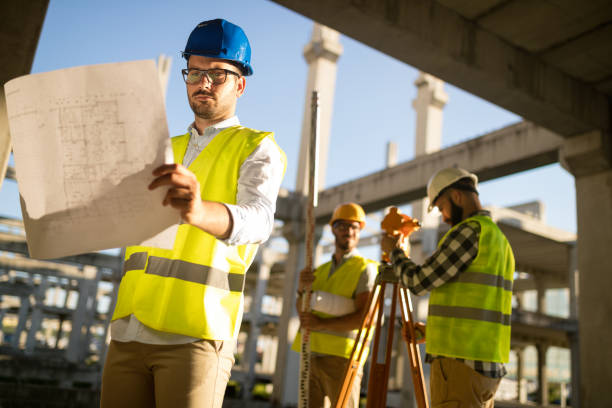 istock Portrait of construction engineers working on building site 922765464