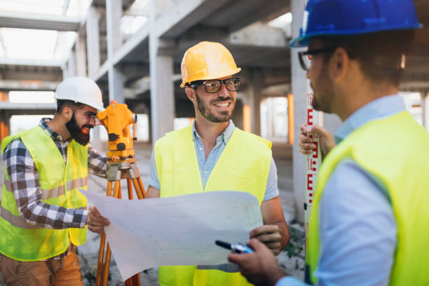 istock Portrait of construction engineers working on building site 922765700