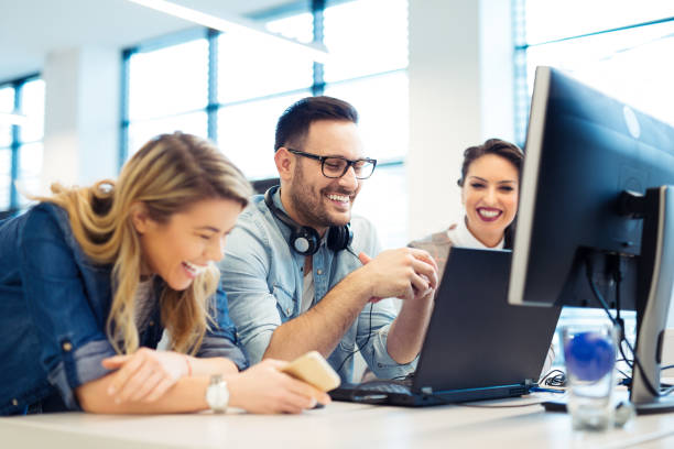 istock Group of business people and software developers working as a team in office 922770976