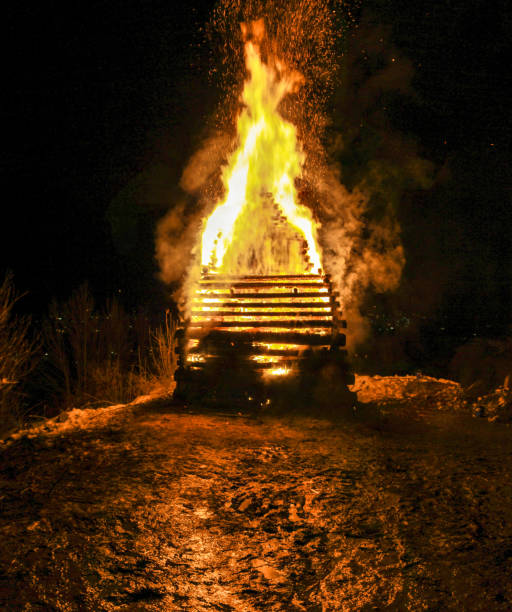 big huge traditional fire. burning of witches in a bonfire. - witchcraft heights imagens e fotografias de stock