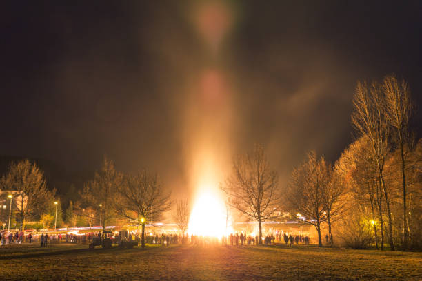 people celebration around big huge traditional fire event. - witchcraft heights imagens e fotografias de stock