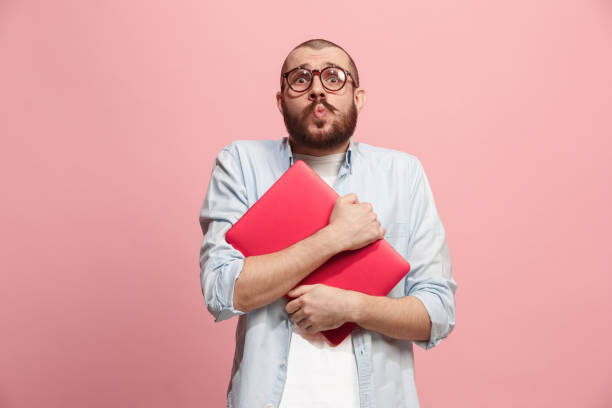 istock Businessman hugging laptop 922771870