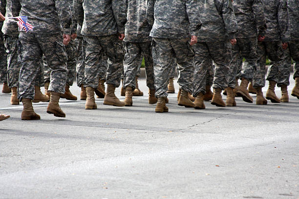 istock American Military Troops Marching along the Street 92277313