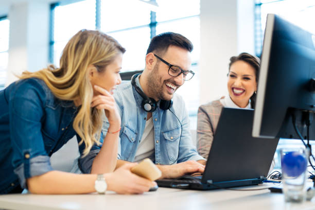 istock Group of business people and software developers working as a team in office 922774310
