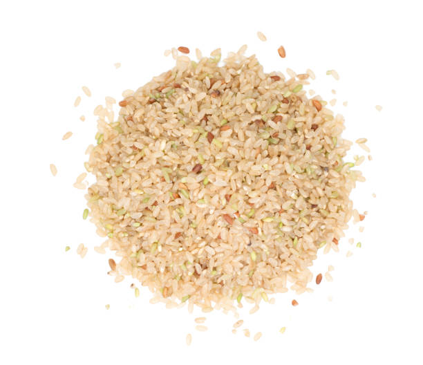 istock Pile of Brown Rice Isolated on White Background 922774378
