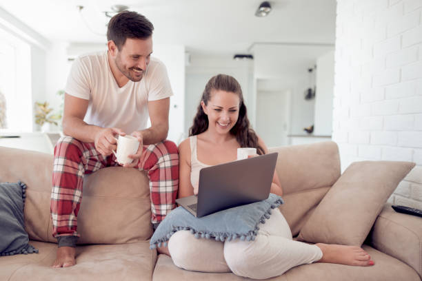 istock Beautiful couple spending time at home in summer morning 922774410