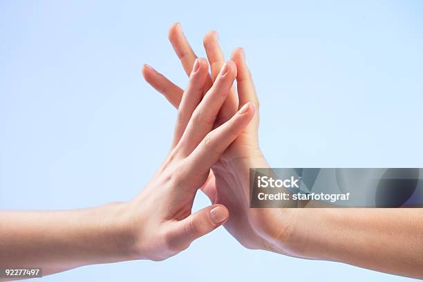 Two People Holding Hands Together Stock Photo - Download Image Now - Adult, Affectionate, Child