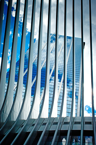 Close up of buildings in Wall Street showing the various sizes and shapes of skyscrapers. It has the buildings of the One World Trade Centre viewed through the Oculus transport hub.