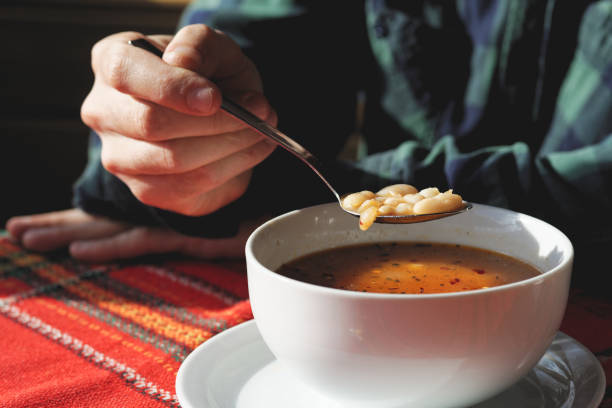 istock White bean soup in white ceramic bowl. 922776226
