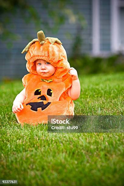 Boy In Pumpkin Costume Stock Photo - Download Image Now - Baby - Human Age, Pumpkin Costume, Halloween