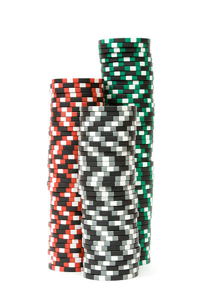 Stack of casino chips isolated over white background stock photo