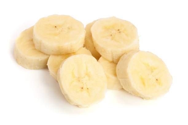istock banana sliced isolated on white background. Top view. Flat lay 922780070
