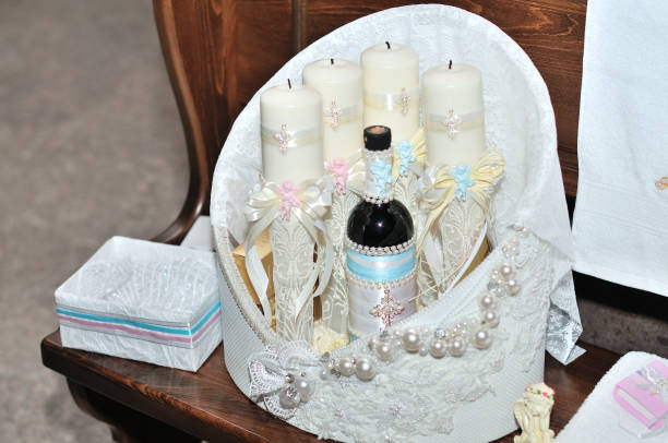 Church supplies for baptism on the table. Ceremony of a christening in church.