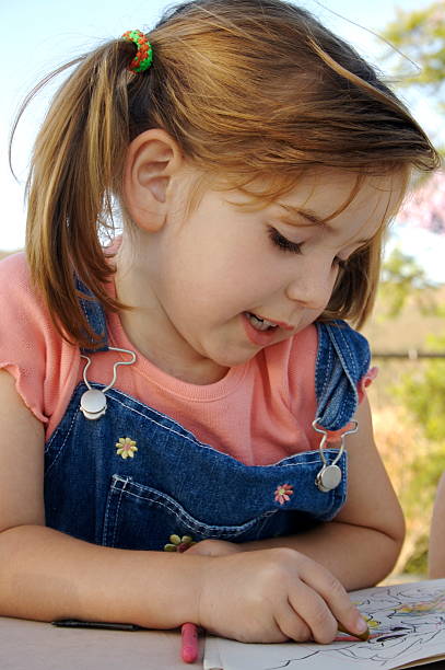istock Little Girl Coloring 92278071