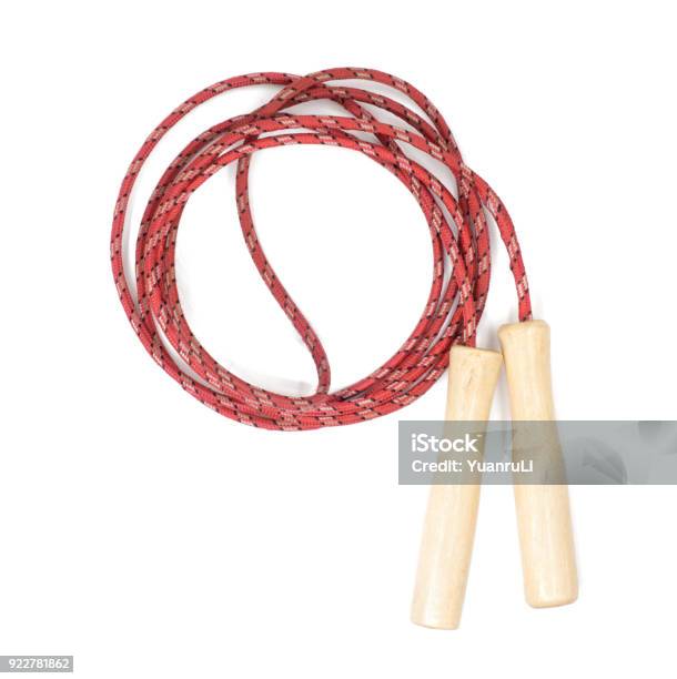 Red Skipping Rope With Wooden Handles Isolated On White With Clipping Path Stock Photo - Download Image Now