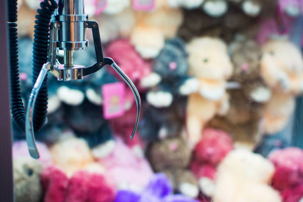 istock Claw crane arcade with toy rewards 922784086