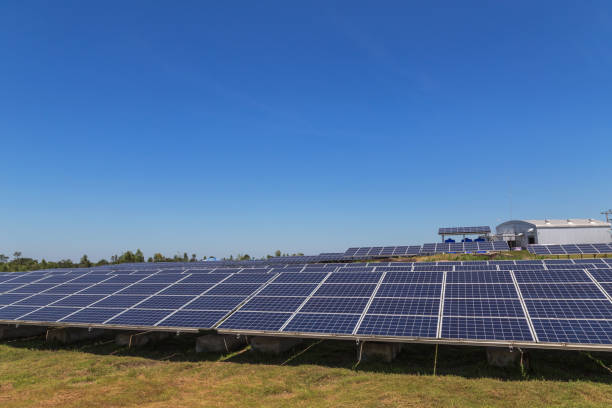 istock rows array of polycrystalline silicon solar cells in solar power plant  alternative renewable energy from the sun on blue sky background 922784894