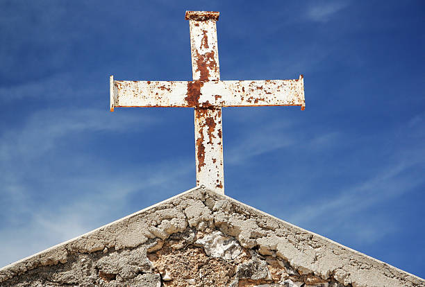 istock Rusty Cross on church roof 92278519