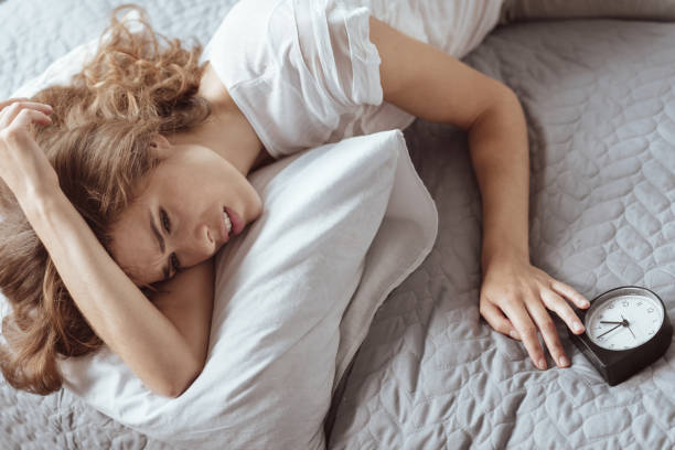 istock Stressed woman having no strength to wake up 922785754