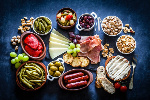 istock Tapas on bluish tint table shot from above 922786560
