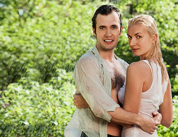 istock Young couple in love under rain 92278730