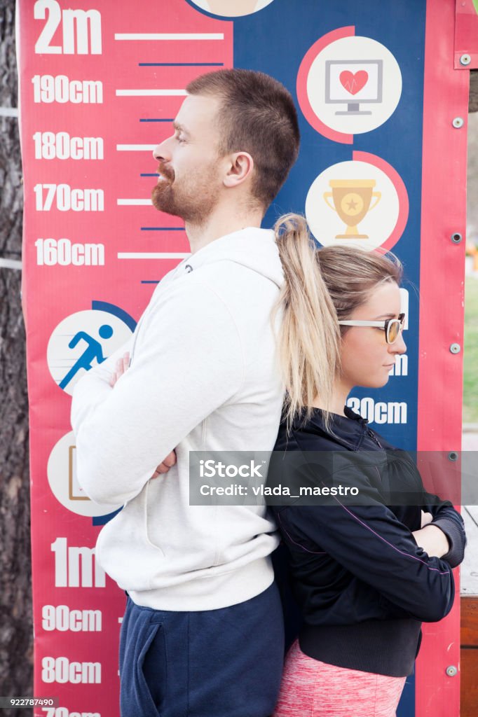 Man And Woman Measured Height Stock Photo - Download Image Now - Adult, Adults Only, Business - iStock Man And Woman Measured Height Stock Photo - Download Image Now - Adult, Adults Only, Business - Istock