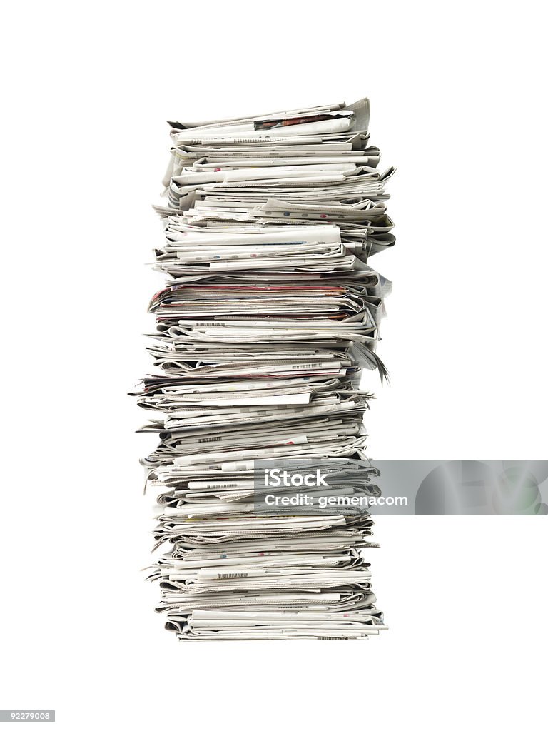 Recycling piles of news papers Pile of newspapers towards white background Color Image Stock Photo