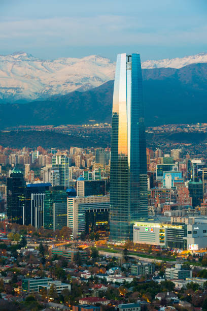 Panoramic view of Providencia and Las Condes districts with Costanera Center skyscraper in Santiago de Chile Santiago, Region Metropolitana, Chile - June 01, 2013: Panoramic view of Providencia and Las Condes districts with Costanera Center skyscraper and Los Andes Mountain Range in the back. sanhattan stock pictures, royalty-free photos & images