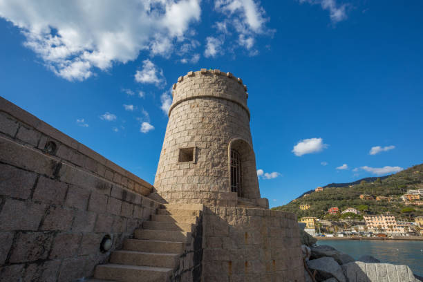 View of the tower on the sea in the city of Recco , Genoa (Genova) Province, Liguria, Mediterranean coast, Italy stock photo