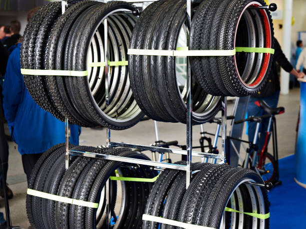 bicycle tires an assortment in store - cyclo cross imagens e fotografias de stock