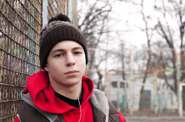 istock attractive young man listening to music 922793878