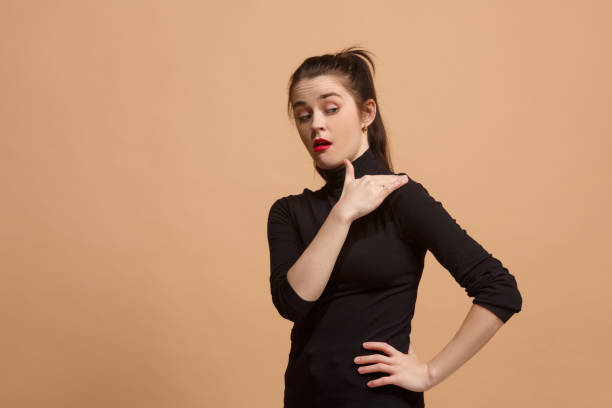 istock Young woman with disgusted expression repulsing something, isolated on the pastel 922797102