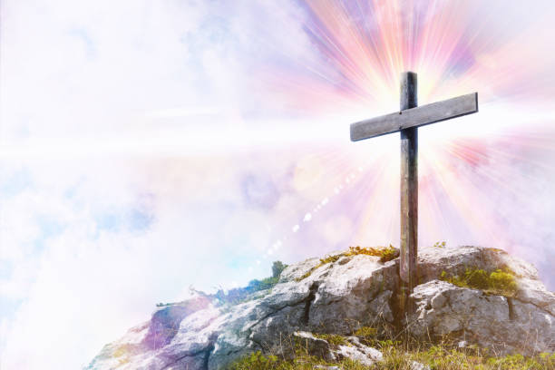 Religious representation with cross on top of a hill Religious illustration with cross with glitter on top of a hill. Horizontal composition protestantism stock pictures, royalty-free photos & images