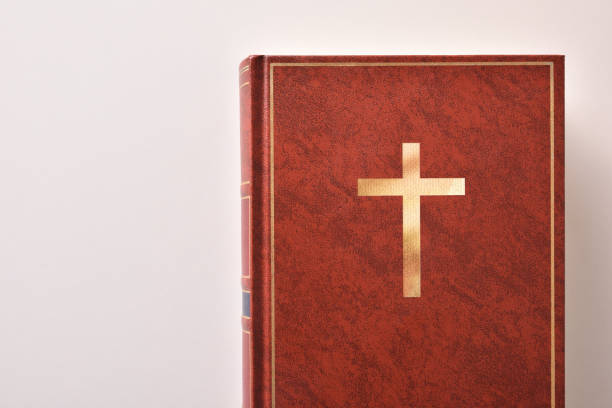 istock Cover of a Bible on a white table 922798492