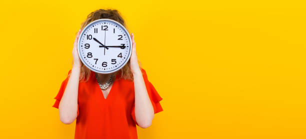 Woman in dress with clocks