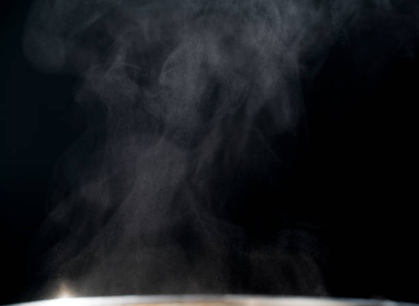 istock White and gray steaming on black abstract background with copy space for text. 922803630