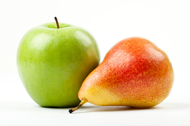 green apple and red pear  pear stock pictures, royalty-free photos & images