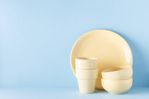 istock Crockery and cutlery on a blue pastel background 922809904