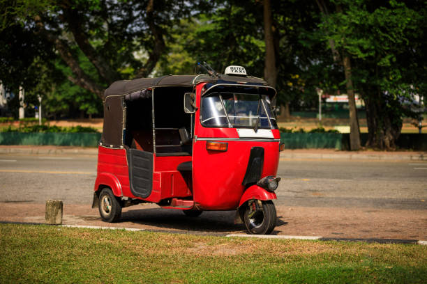 Tuktuk taxi on the street, Sri Lanka Tuktuk - motorized development of the traditional pulled rickshaw taxi sri lanka stock pictures, royalty-free photos & images