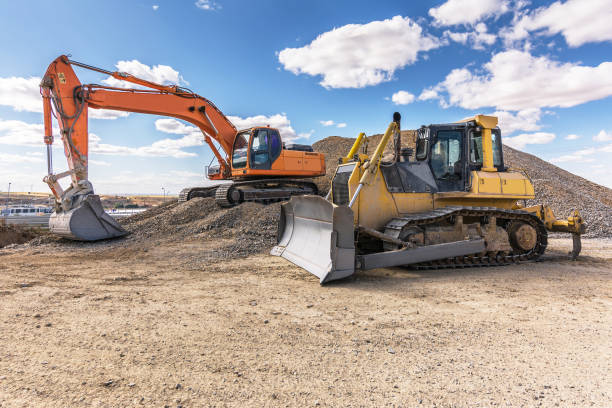 istock Outdoor quarry with heavy machinery 922814144