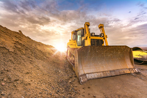 Excavator on the construction works of a road