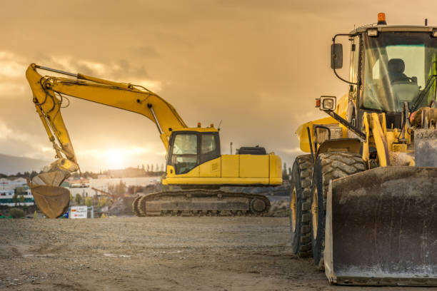 istock Outdoor quarry with heavy machinery 922814510