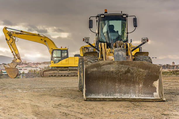 istock Outdoor quarry with heavy machinery 922814524
