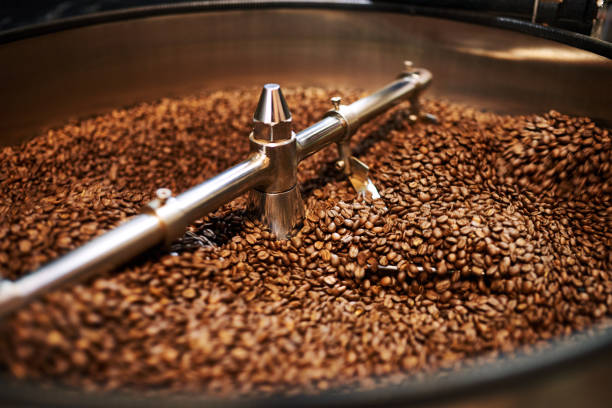 istock Coffee beans mixing in cooling drum after being freshly roasted 922814606