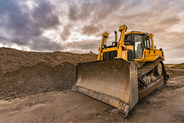 istock Excavator on the construction works of a road 922814778