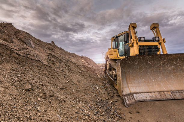 istock Excavator on the construction works of a road 922814812