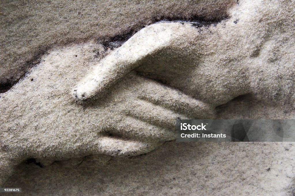 Corp(se)orate Handshake Handshake closeup taken in a graveyard. Agreement Stock Photo