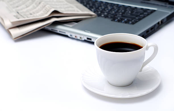 istock Cup of coffee and newspaper 92281826