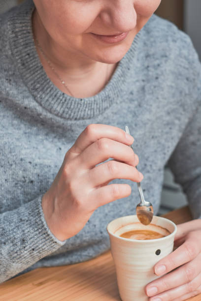 istock Woman drinking a cup of coffee 922822620