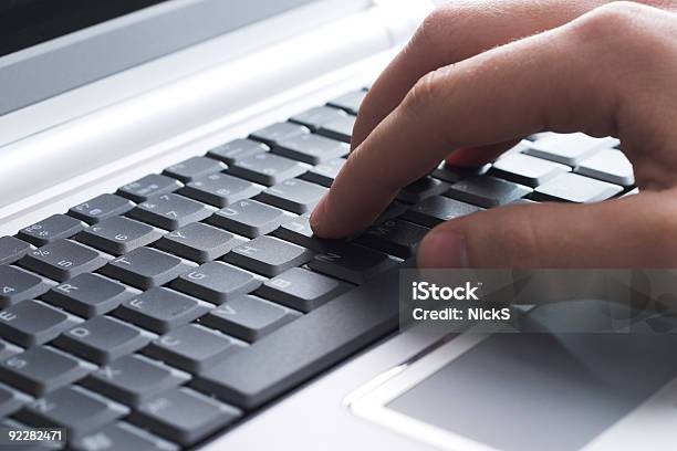 Closeup Of Hand On Laptop Keyboard Stock Photo - Download Image Now - Business, Color Image, Communication